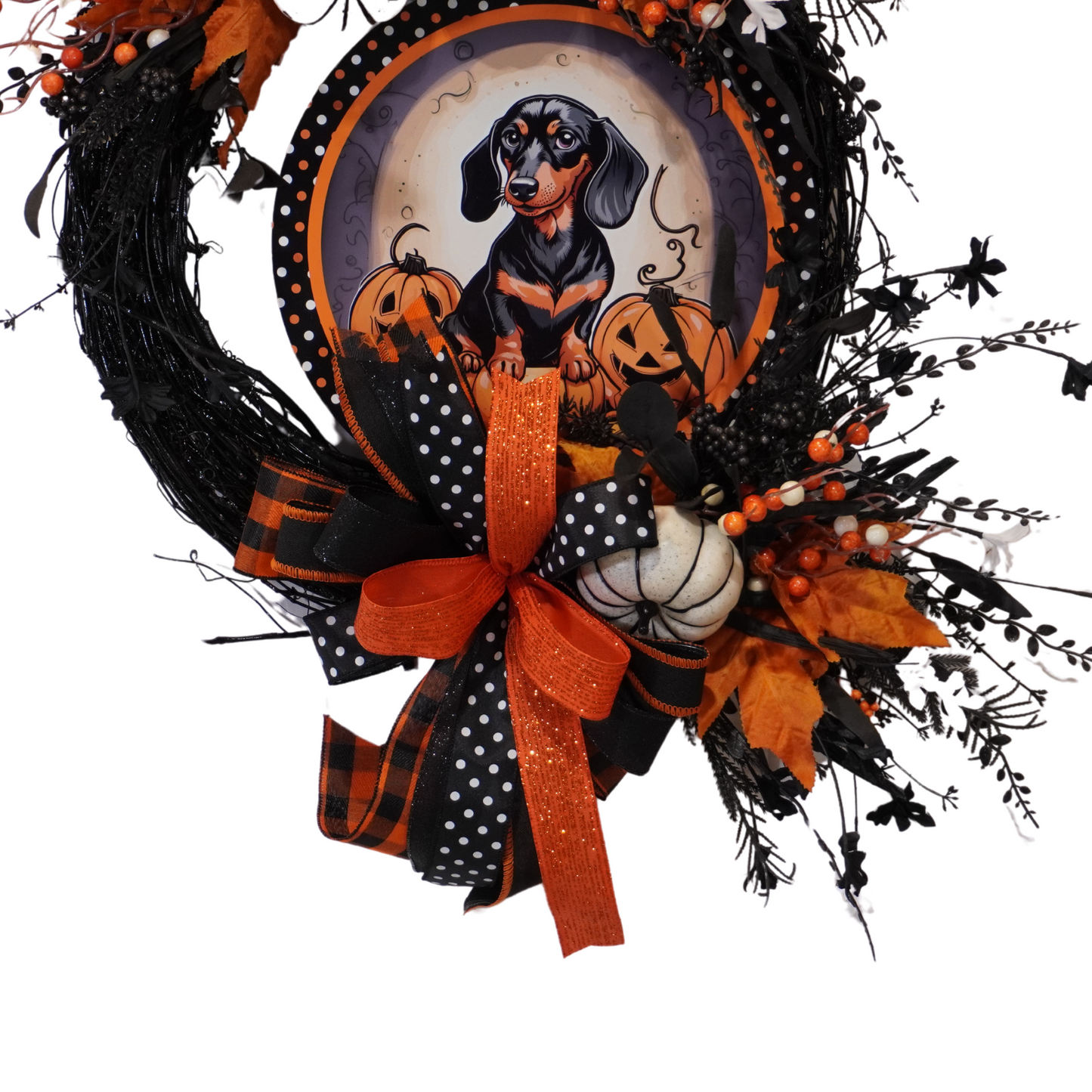 Happy Halloween Weiner Dog themed wreath on a Black Grapevine base the a metal Weiner Dog and Jack-o-lantern sign