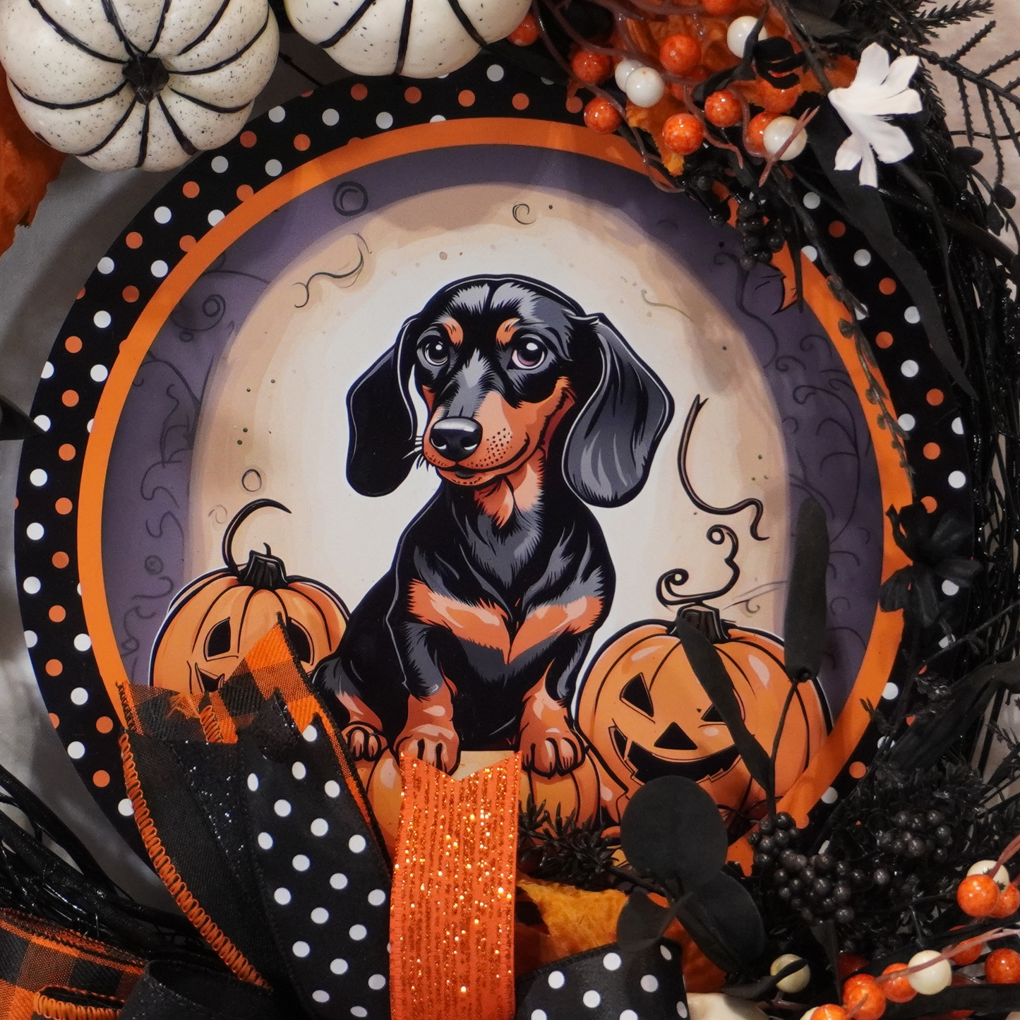 Happy Halloween Weiner Dog themed wreath on a Black Grapevine base the a metal Weiner Dog and Jack-o-lantern sign