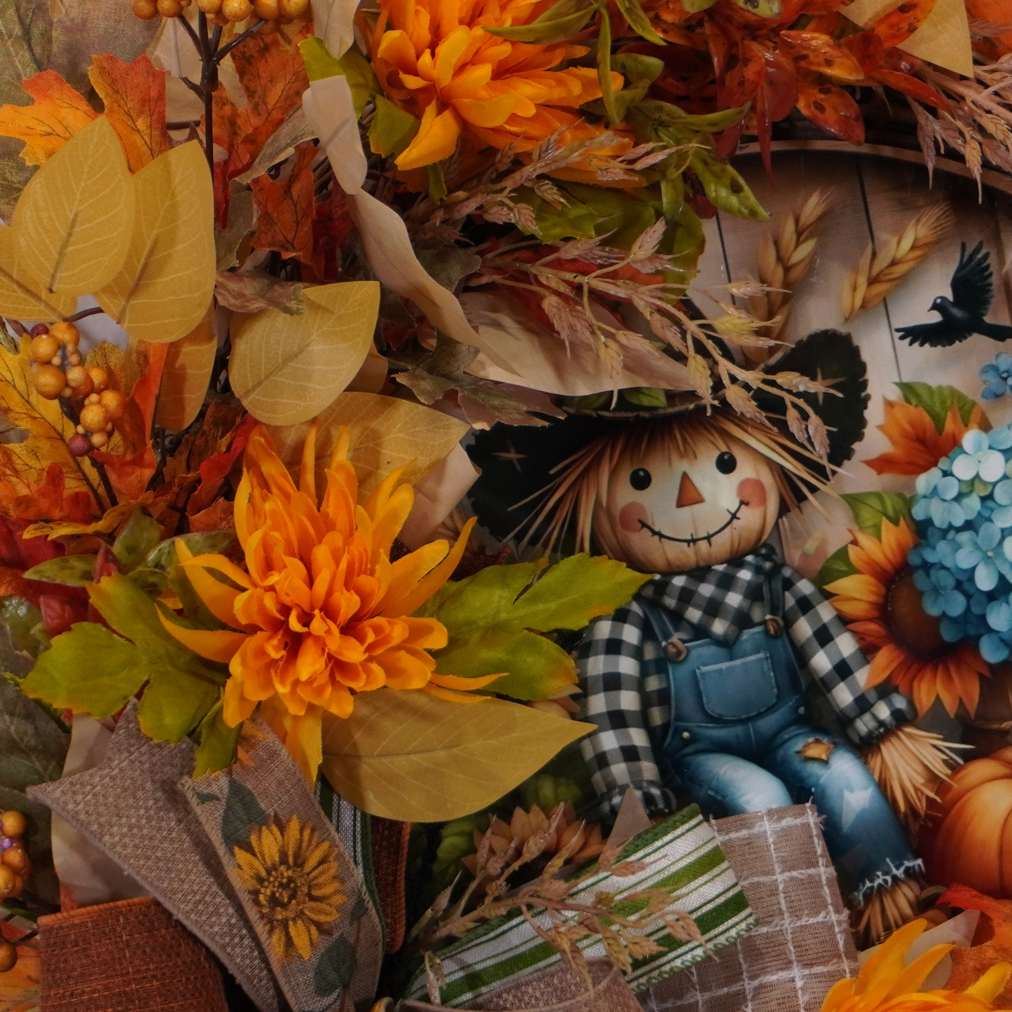 Fall Grapevine wreath with Sunflowers, and a metal sign with a Scarecrow, Blue Hydrangeas, and pumpkins