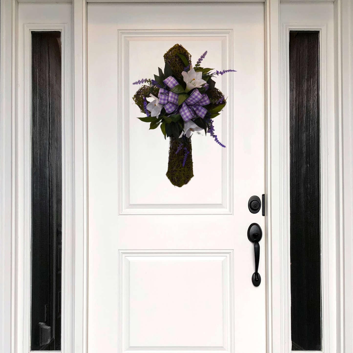 Moss Cross Religious or Easter themed design door hanger on a Moss Cross base with Lilies and a Purple Gingham bow