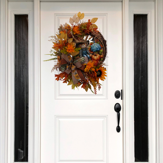 Fall Grapevine wreath with Sunflowers, and a metal sign with a Scarecrow, Blue Hydrangeas, and pumpkins