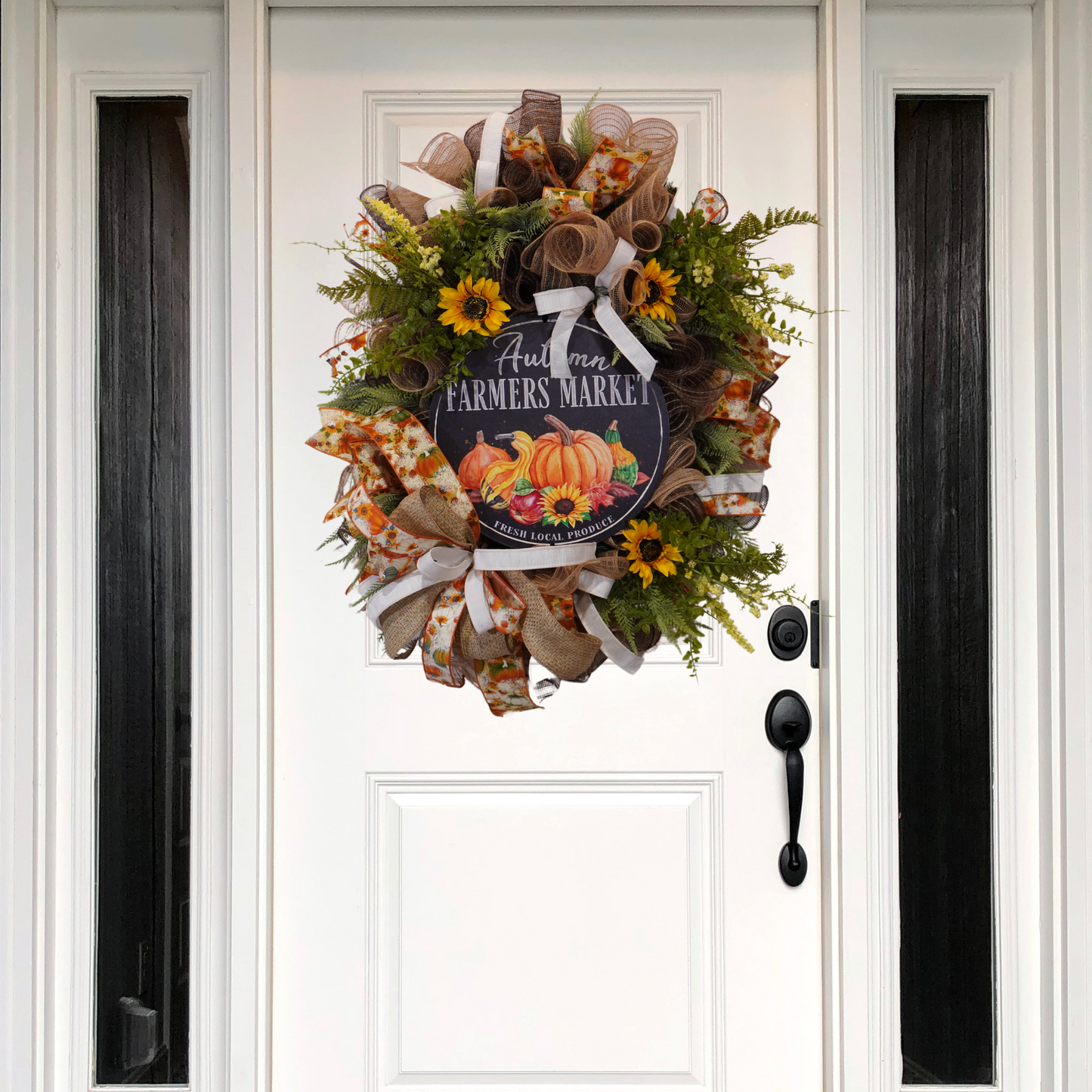 Autumn Fall Farmers Market wreath with Sunflowers, Greenery and metal sign with pumpkins on an evergreen base