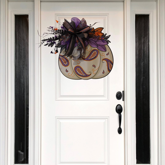 Paisley Falloween Pumpkin Wooden Door Hanger with a larger bow