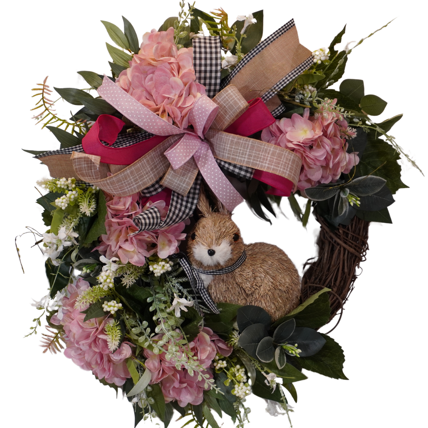 Spring Easter Bunny wreath with Pink Hydrangeas, Greenery, and a bow on a grapevine base