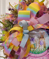 Hoppy Easter Spring wreath with embossed metal sign made on an Evergreen wreath