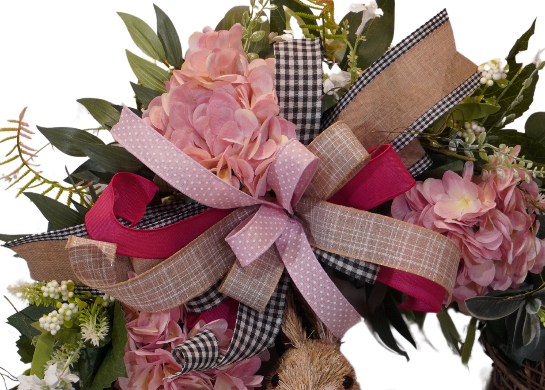 Spring Easter Bunny wreath with Pink Hydrangeas, Greenery, and a bow on a grapevine base