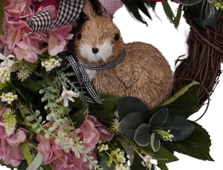 Spring Easter Bunny wreath with Pink Hydrangeas, Greenery, and a bow on a grapevine base